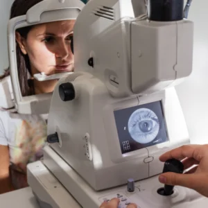 Eye exam machine with a patient.